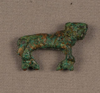 Archaeological bronze lion figurine