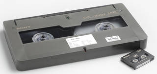 D2 cassette pictured with DAT for scale