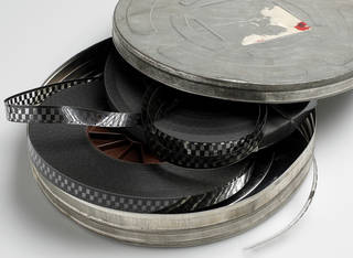 16 millimeter film in a metal can