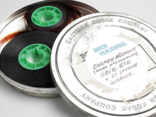 16 millimeter film negative rolls in a metal can