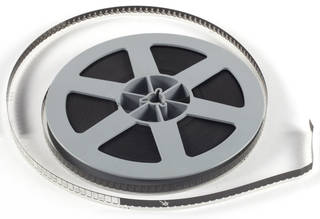 8 millimeter film on a reel
