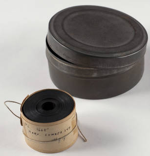 Acetate microfilm roll and cannister