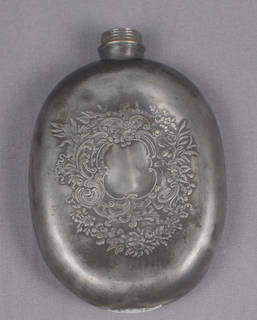 Pewter flask with crevices