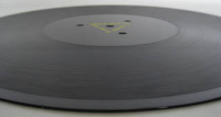 Side view of lacquer transcription disc