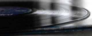 Vinyl record viewed in raking light