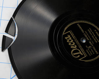 Broken outer edge of a shellac disc